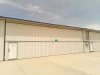 Hangar_115_-_1._front_with_bifold_door_closed_list.jpg